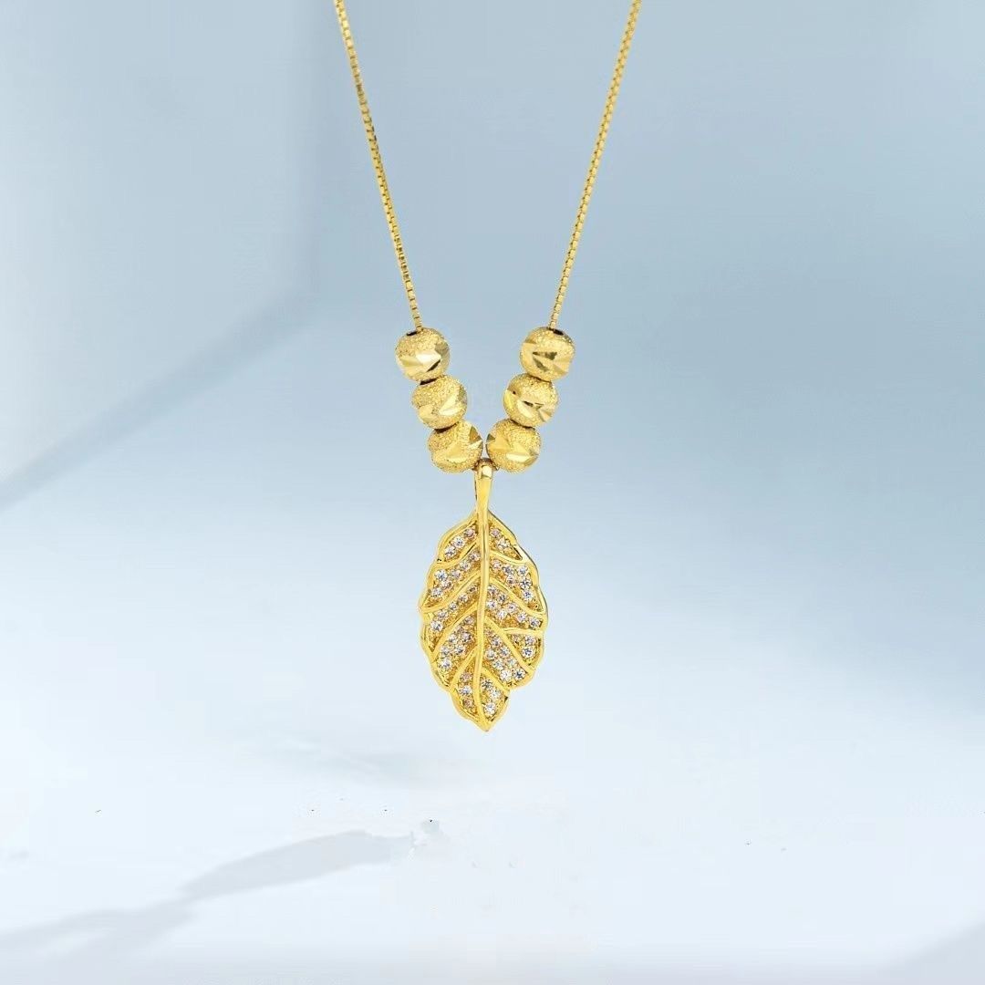 Neues Zirkonium mit Mikroeinlage, goldene Zweige, Jadeblätter, elegante und leichte Luxus-Boxkette am Schlüsselbein, Halskette mit High-End-Design_voghion.com