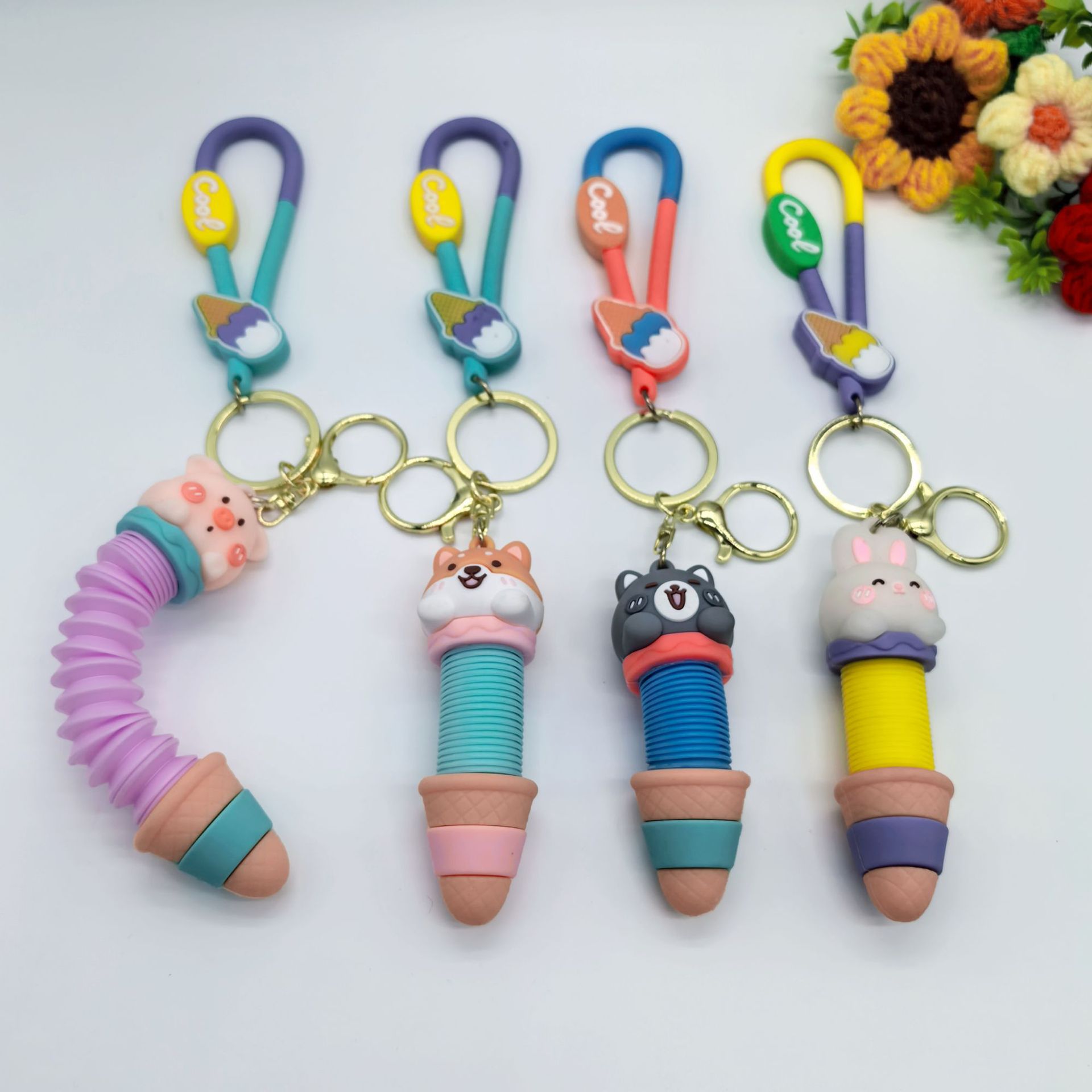Descomprimir dibujos animados telescópicos lindos creativos animales helados llavero colgante bolsos de automóviles colgante regalos de actividad