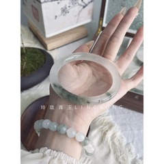新疆の天然天山翠金糸玉のブレスレットの氷の種の漂う花の細い丸い条の美人は翡翠と田玉に匹敵します。