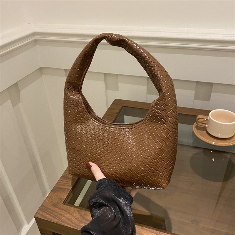 2025 moda popular trenzada simple bolso de viaje de nicho bolso de brazo bolso de hombro de gran capacidad