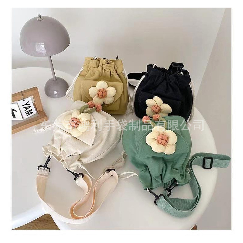 帆布包日系小清新抽绳束口袋花朵水桶包软妹斜挎包休闲单肩包