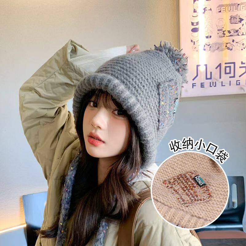 New pocket tassel cap women's winter windproof riding knitted cap ear protection warm cold wool cap wholesale