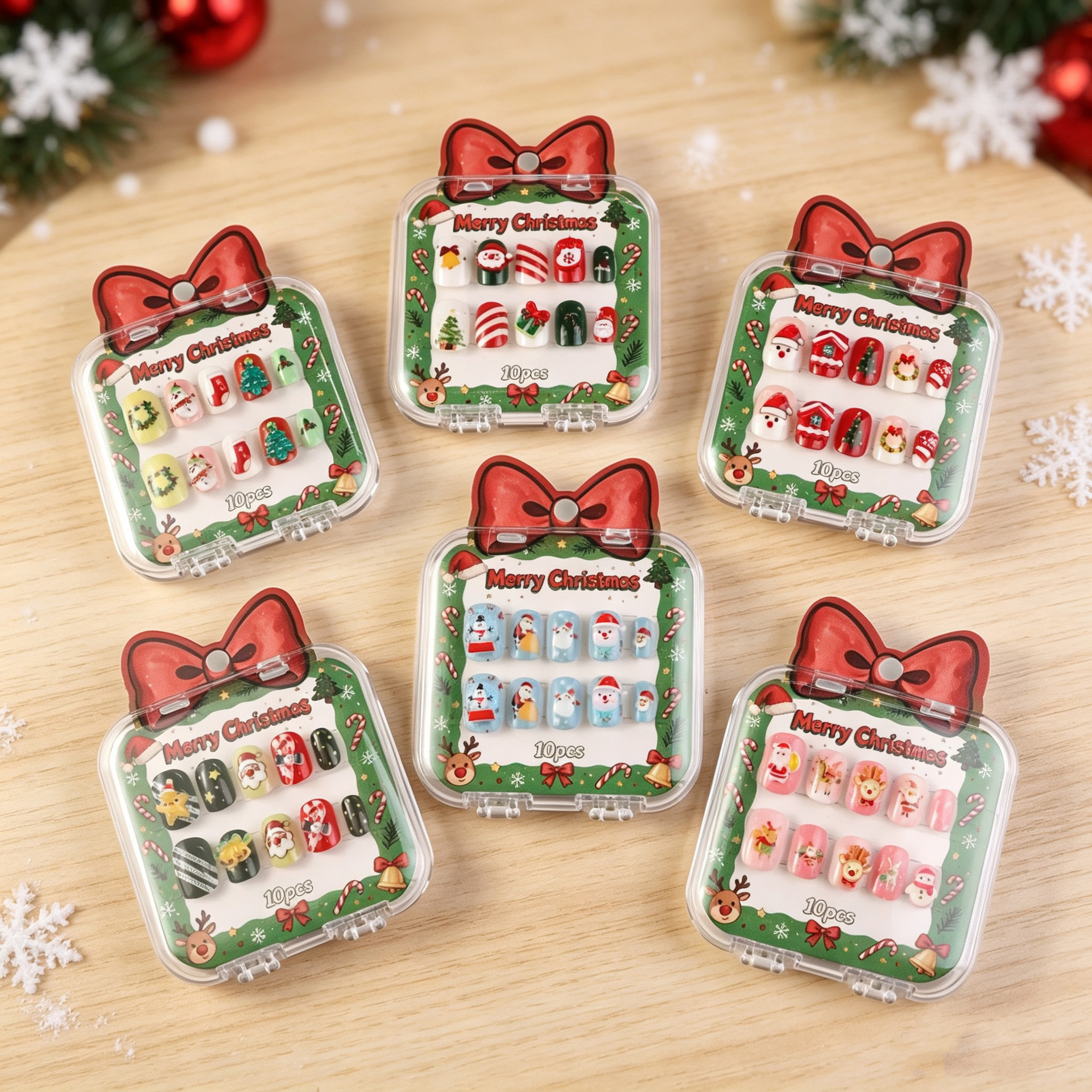 New Christmas children's wearable nails with snowflake and Christmas tree designs, detachable Christmas nail art with candy cane and gift motifs