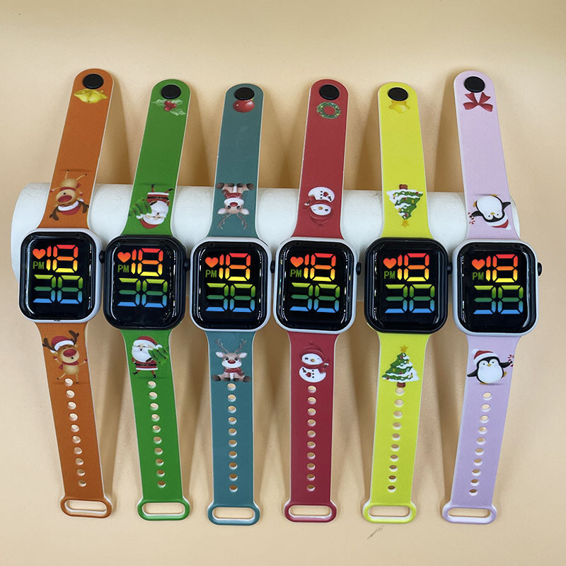 El comercio exterior de impresión en color de dibujos animados LED reloj electrónico color fresco luz botón digital niños estudiante reloj fuente de fábrica