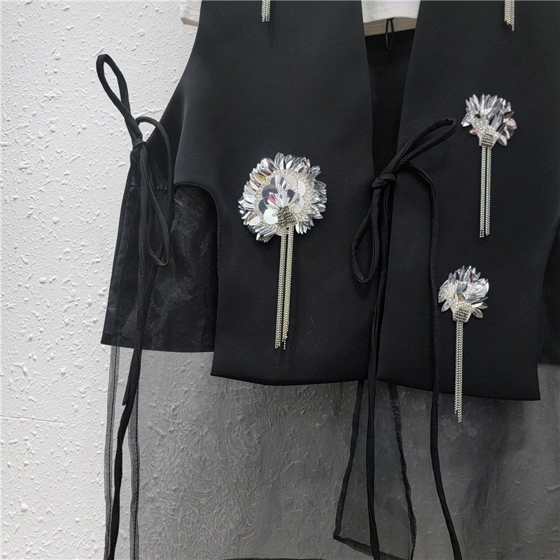 Traje negro chaleco de mujer 2026 nuevo chaqueta de pañuelo chaqueta de caballo empalmado ogan plegable sin mangas