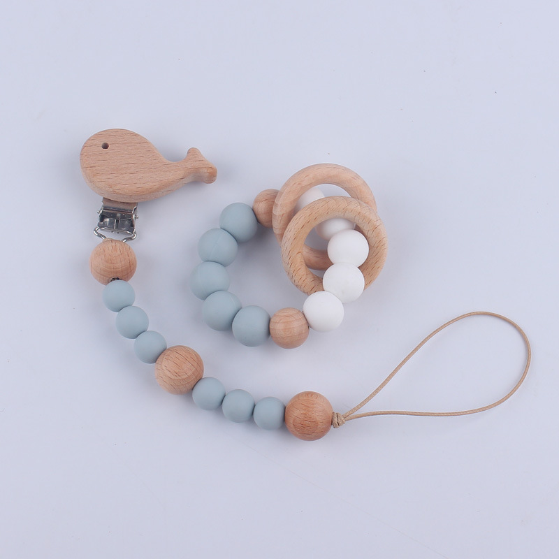 Nuevo Bebé y niño suministros de dibujos animados clip de haya calmante bebé chupete cadena mordedor pulsera de juguete conjunto de dos piezas