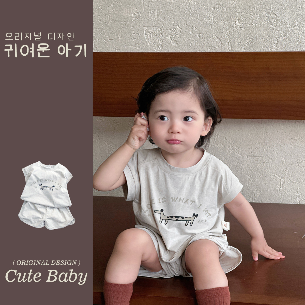 Baby Puppy Print Versión coreana sin mangas de verano recién nacido Pantalones cortos de estilo occidental Baby A Thin Summer Traje de dos piezas