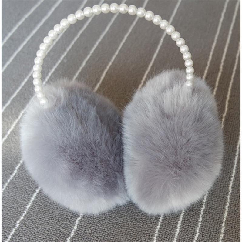 Nueva caliente lindo orejeras de felpa de invierno caliente a prueba de frío fábrica al por mayor de piel de conejo orejeras piel