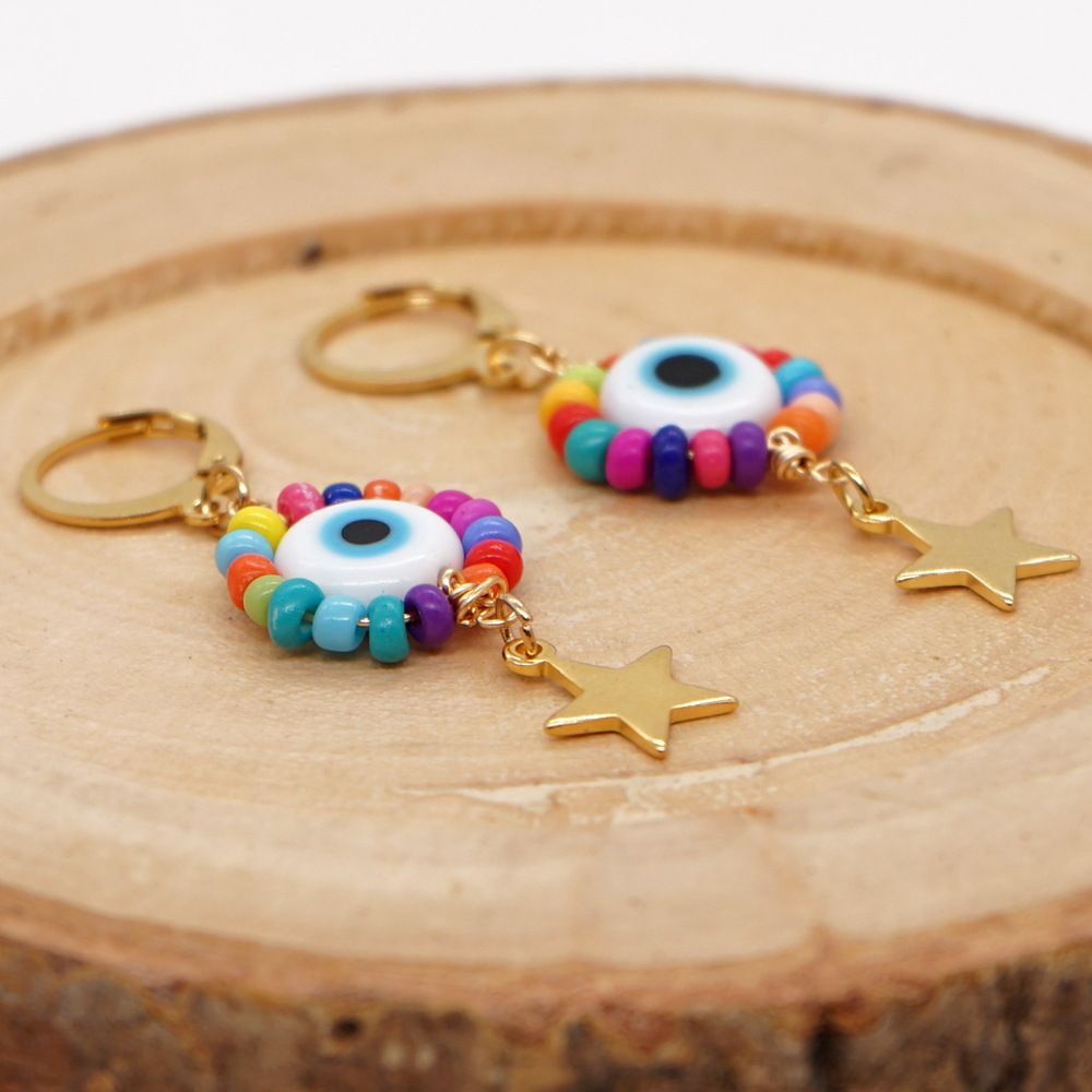 Fashion Pentagram Eye Mixed Materials Glass Earrings display picture 5