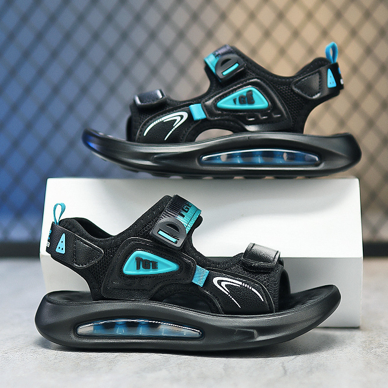 Nuevas sandalias 2025 zapatos de playa de verano masaje suela suave partículas al por mayor antideslizante cojín de aire de playa para niños