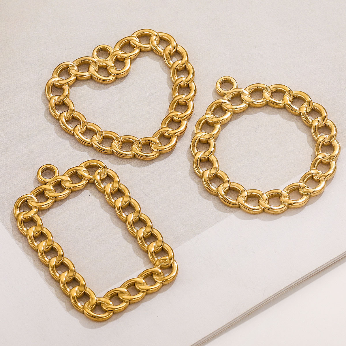 Personalidad coreana de acero inoxidable círculo de torsión rollo NK pendientes pendientes DIY accesorios hechos a mano