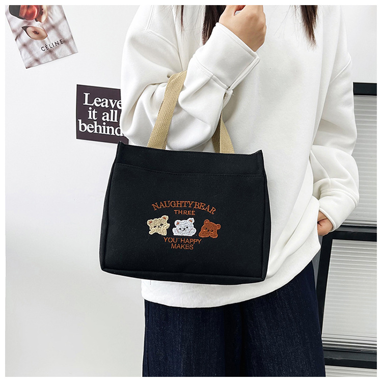 New wholesale fashionable and high-quality canvas handbag, simple and portable, easy to carry for going out, versatile lunch box and bento bag undefined