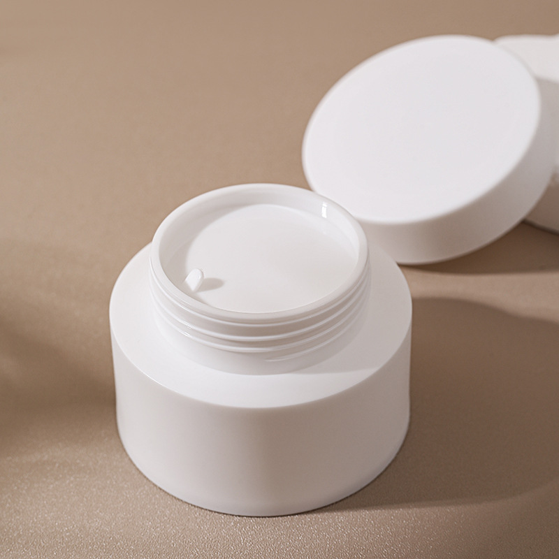 Fábrica al contado 30g / 50g / 80g caja de crema portátil PP material caja de crema exfoliante caja de embalaje cosmético