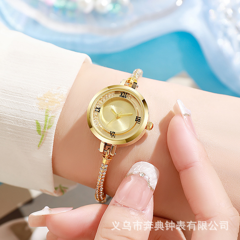 Pulsera literal de diamantes rotos de sensación de nicho de alta gama, reloj, cinturón pequeño, nuevo reloj de mujer de cuarzo de arena movediza de celebridades de Internet al por mayor