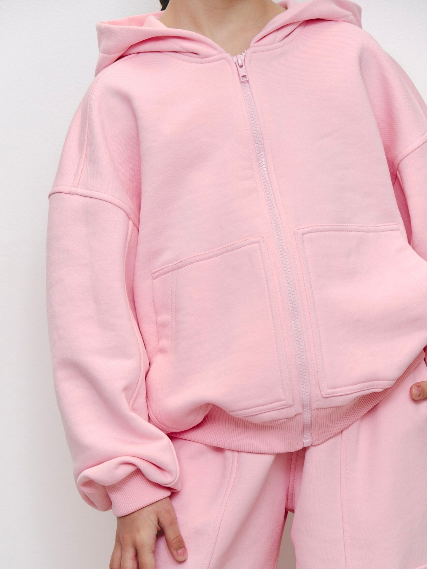 Barnjacka med huva och dragkedja i enfärgad casual stil_voghion.com