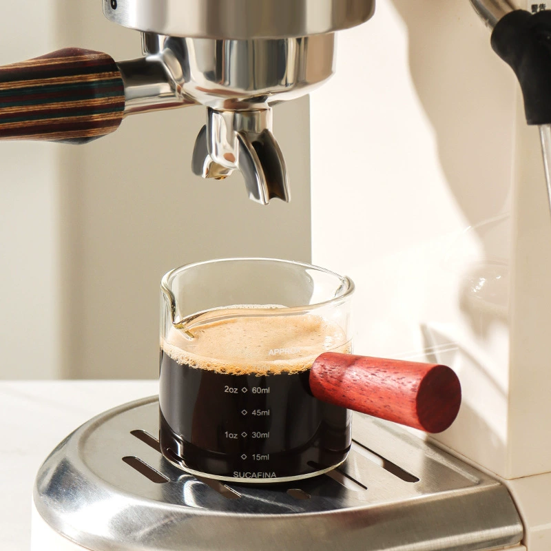 Coffee extract, measuring cup, glass concentrate scaled