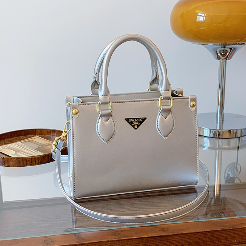 Bolso Tote simple para mujer 2025 nueva moda tendencia bolso de mensajero textura todo fósforo bolso de viaje de gran capacidad