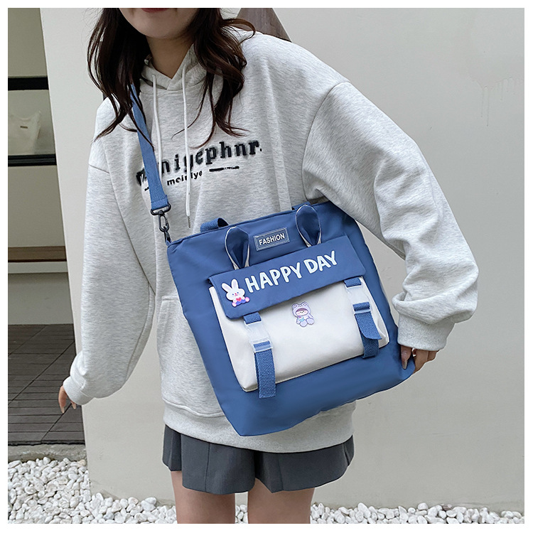 Large-capacity file bag, primary school student handbag that can be carried on one shoulder, book bag for girls with high appearance standards, homework books and test papers bag undefined