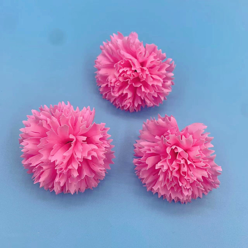 10 cabezas de flores rosadas en claveles