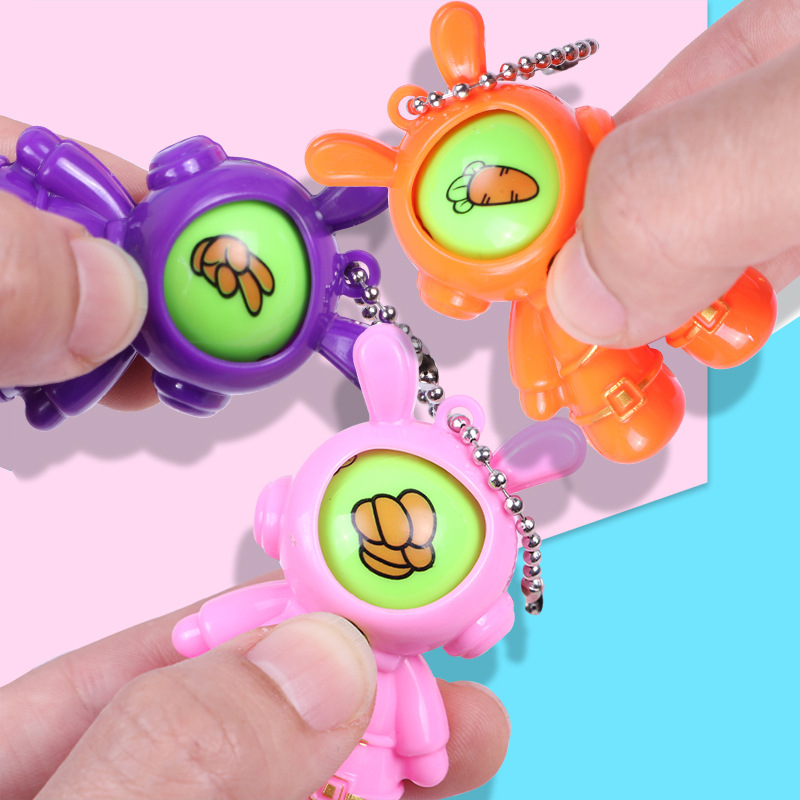 Mini boxeo de adivinación conejo de rábano pequeño juguete promocional pequeño premio tijeras tela de piedra juego huevo colgante llavero