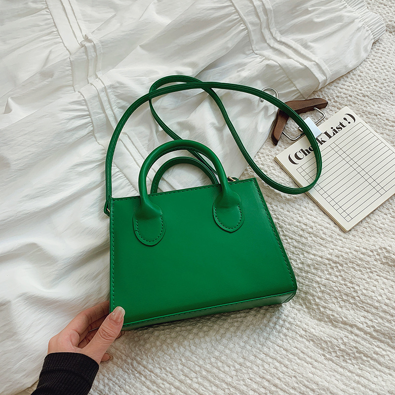 Bolso de mensajero femenino con textura de línea de moda 2025 nuevo bolso femenino portátil de moda de todo fósforo bolso cuadrado pequeño de gran capacidad de cercanías