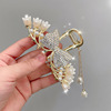 Metal crab pin from pearl, hairgrip with tassels, shark, orchid