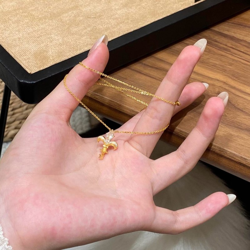 新商品の矢の形のアイリスの花の糸のネックレスの女性の軽くて豪華な大衆の高級感の甘くてかわいいです。|undefined