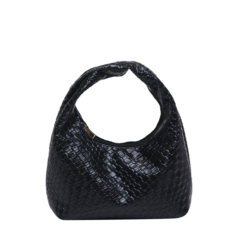 Bolsa de tejido francesa de alto nivel para mujeres 2025 nuevo bolso de bolsillo de nicho de textura de bolso de viaje de bolso de mano universal