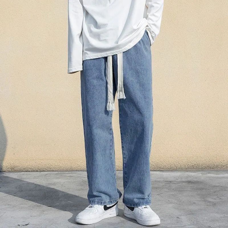 Jeans de cintura elástica de tamaño grande, pantalones rectos de primavera y otoño, pantalones sueltos retro, nuevos pantalones de moda de estilo americano de Hong Kong.