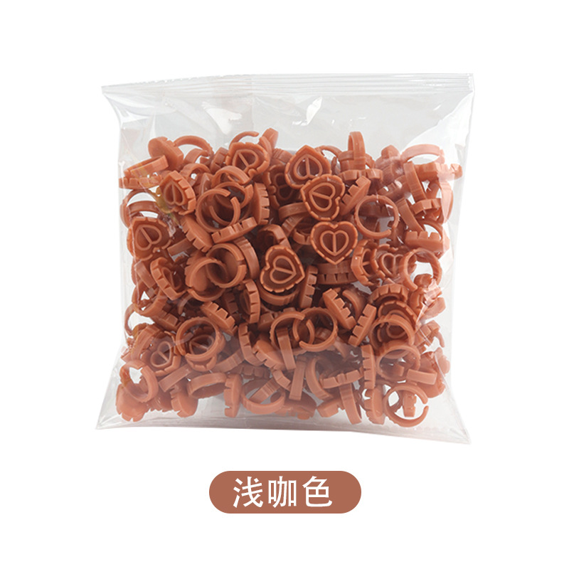 Venta al por mayor de pestañas postizas injertadas taza de anillo de goteo de pegamento 100/paquete de hermosas pestañas flor taza de anillo herramienta de bandeja de pegamento