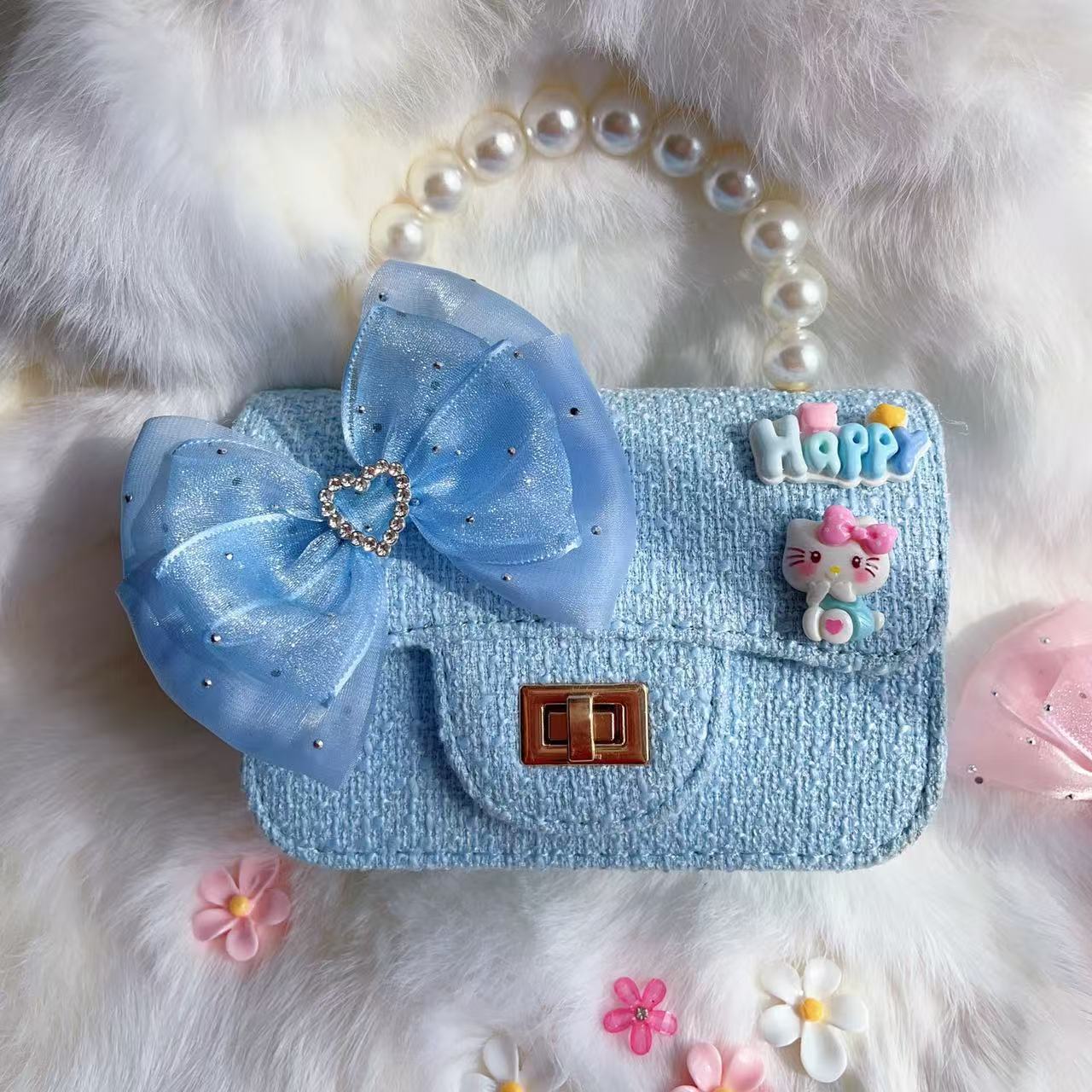 Nuevo tipo de bolsos para niños, bolsos de moda, bolsos de princesa de viento, bolsos portátiles lindos para chicas, bolsos de red para bebés.