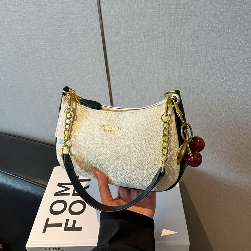 New cross-border shoulder bag with a high-end feel, solid color underarm bag, fashionable and versatile crossbody bag for commuting, fresh and stylish women's bag