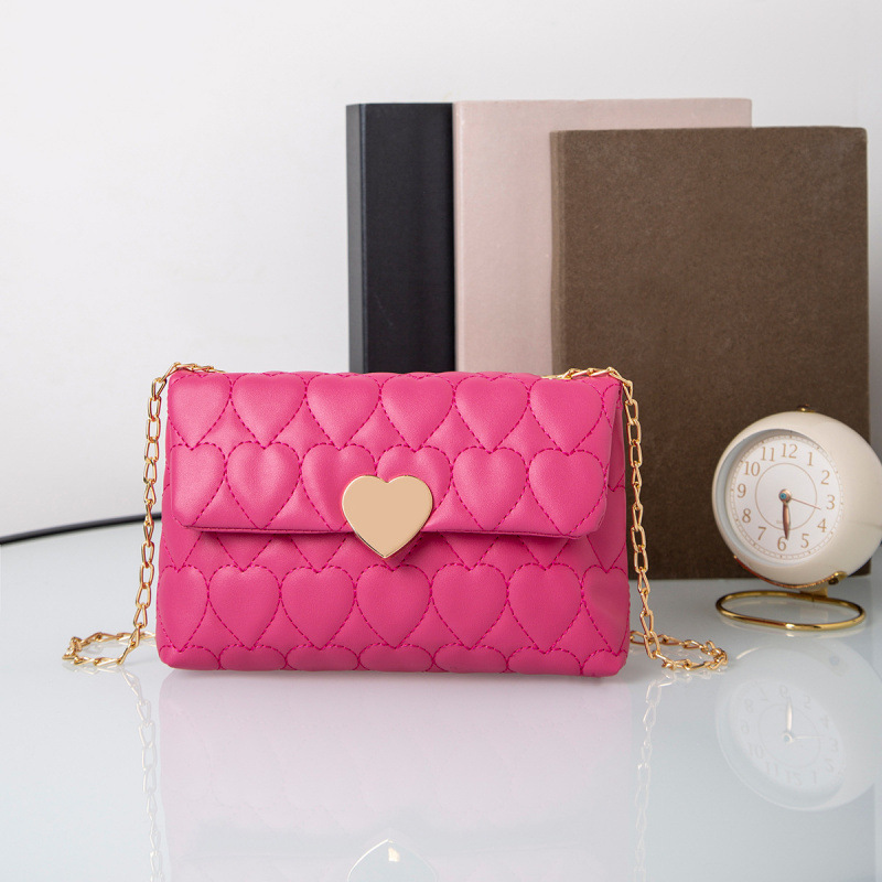Bolsa de hombro de cerradura de corazón de melocotón comercio exterior al por mayor 2025 primavera y verano nuevo bolso multifuncional de mujer, bolso de mujer interior