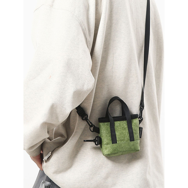 杜邦纸袋定 制印logo图2025新款潮牌男手提装饰挂包休闲运动牛皮