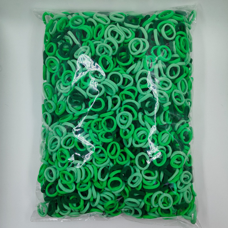 Fábrica directa sin costuras de alta elasticidad cuerda de cabeza para niños anillo de toallas OPP2000 anillo de cabello de cabello para bebés al por mayor