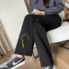 Golden thin trousers, loose straight fit