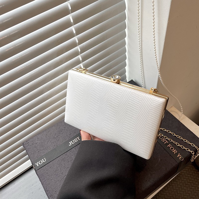 Nuevo paquete de cena de lujo ligero de damas huesos de pescado bolsas de mano clip brillante de fiesta celebridades bolsas de cena de moda