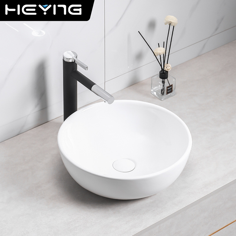 lavabo de cerámica lavabo de baño de hotel de arte pequeño tipo lavabo único lavabo gabinete de baño lavabo circular image 4