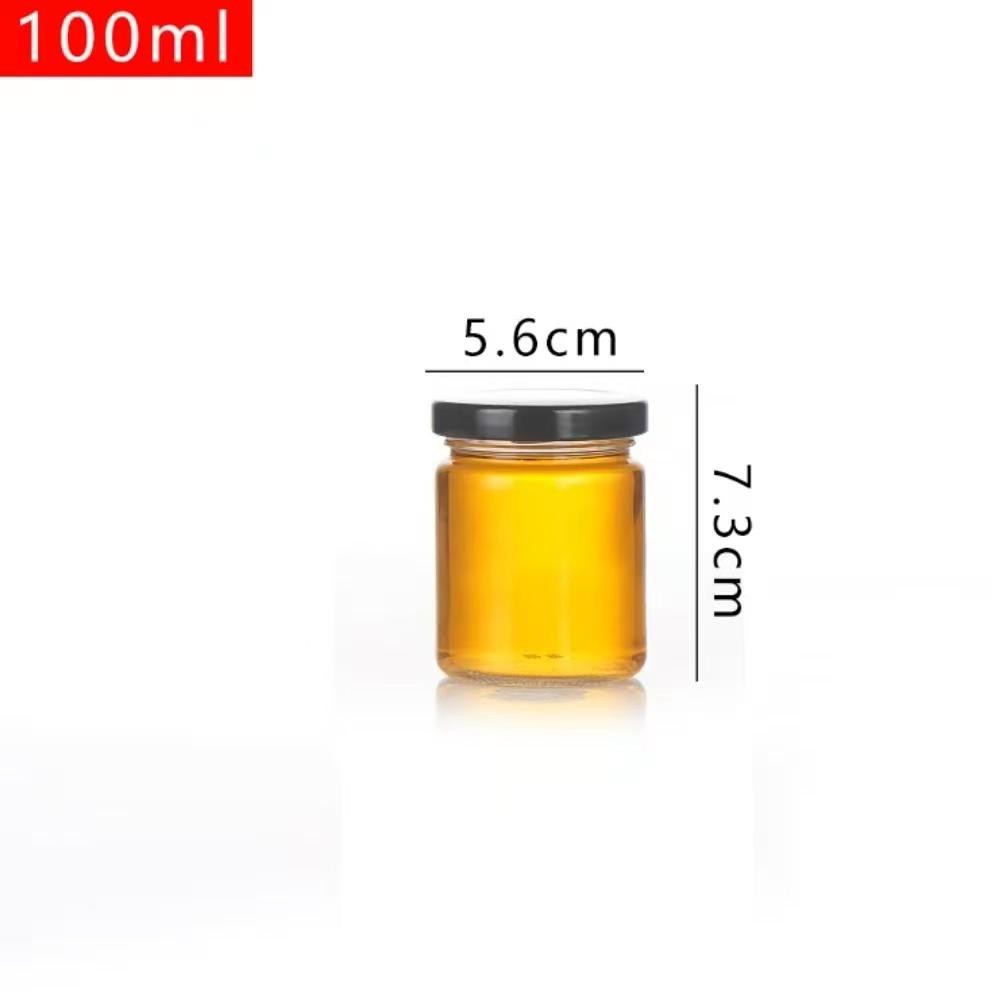Botella de vidrio al por mayor botella vacía de grado alimenticio hervir botella de conservación de miel mermelada botella de hongos shiitake