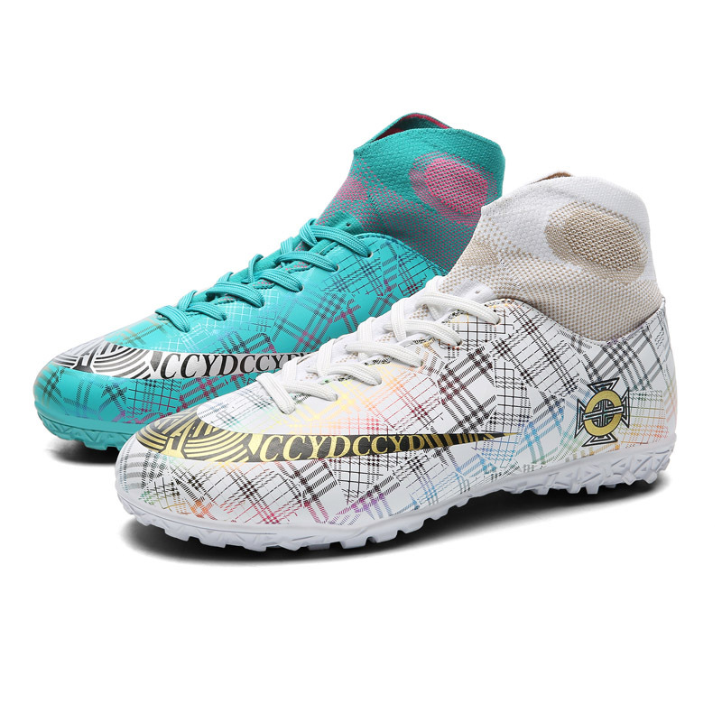 Venta al por mayor zapatos de fútbol resistente al desgaste transpirable Pato Mandarín color alto-top antideslizante Plaid casual corto clavo hierba juventud entrenamiento zapatos