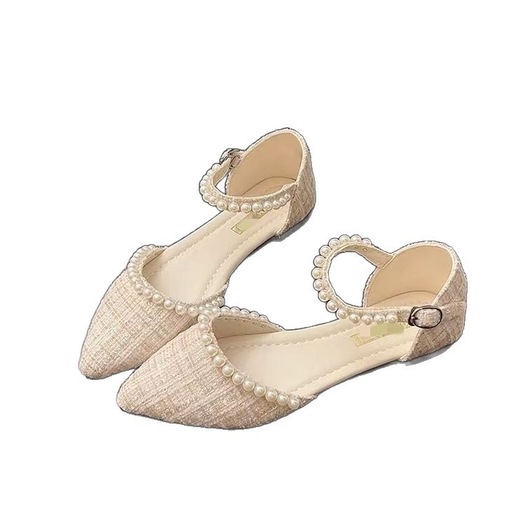 Baotou sandalias para mujeres 2026 nuevo verano en línea Fairy estilo de perla francesa punta plana con falda zapatos individuales