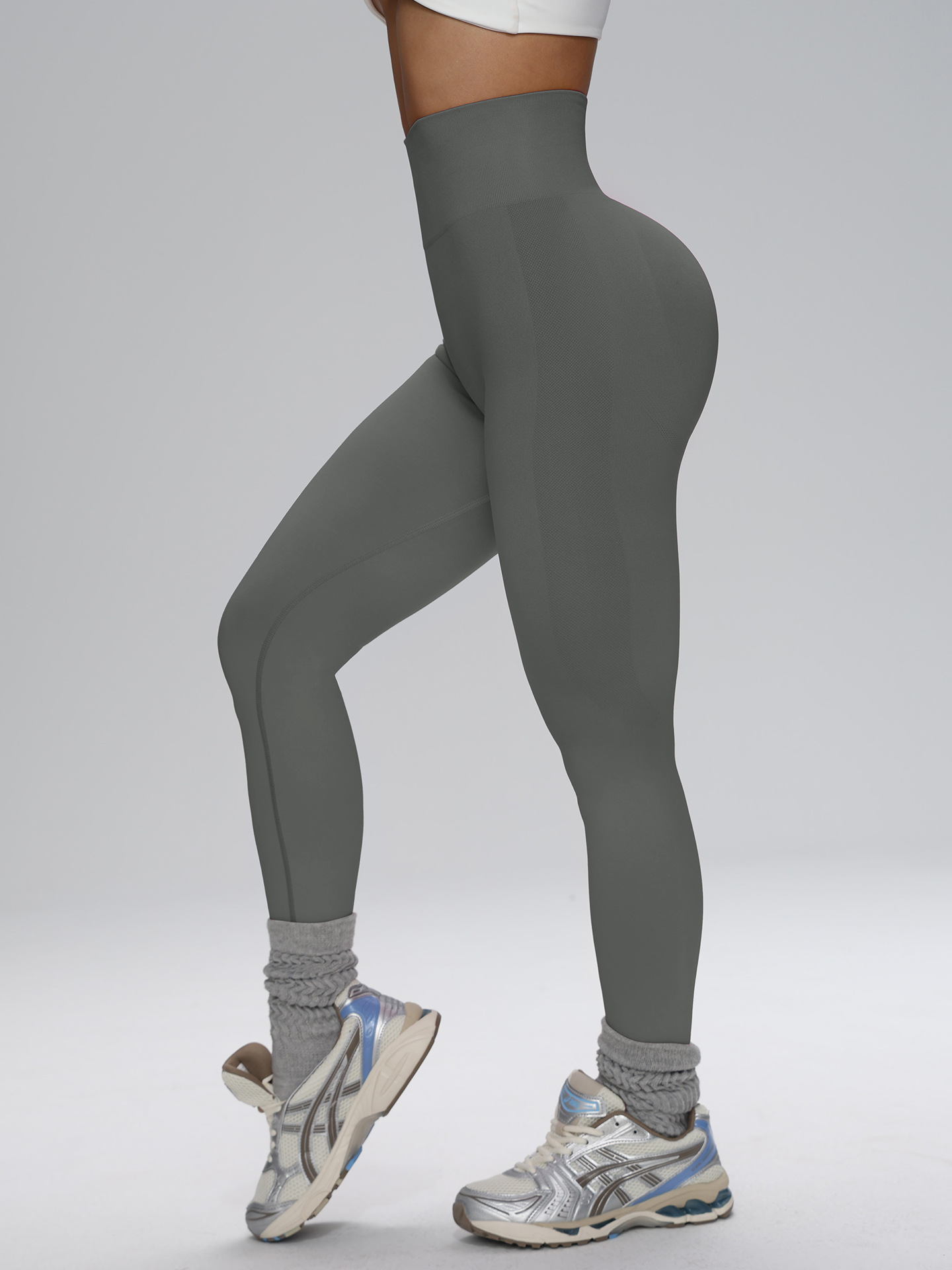 Europa y los Estados Unidos sin costuras cintura alta pantalon de gimnasio de alta cadera para mujeres corriendo al aire libre apertado nueve pantalones de pelusa de miel