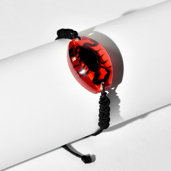 Bracelet red background black scorpion