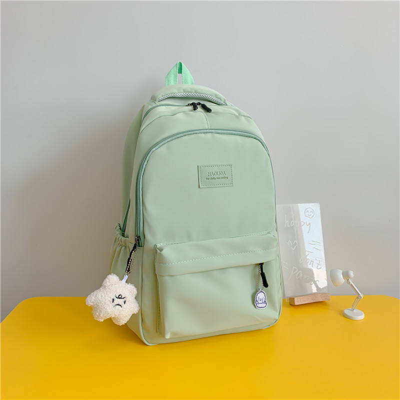 Mochila de las mujeres nuevo nylon color sólido estudiante de la escuela secundaria mochila de gran capacidad simple todo-fósforo estudiante universitario mochila impermeable