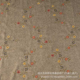 源头工厂 全涤呢绒绣花布料 时装棉服外套帽子靠垫家纺刺绣面料布