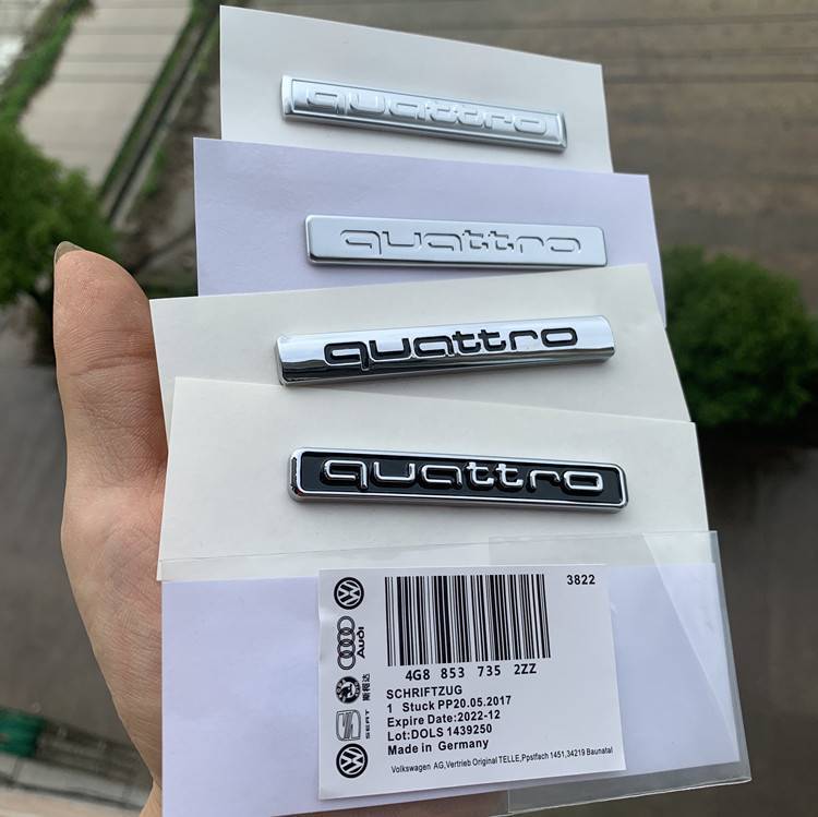 Suitable for Audi center console four-wheel drive models A3, A4, A5, A7, A6L, Q3, Q5, Q7, and quattro front and rear emblems