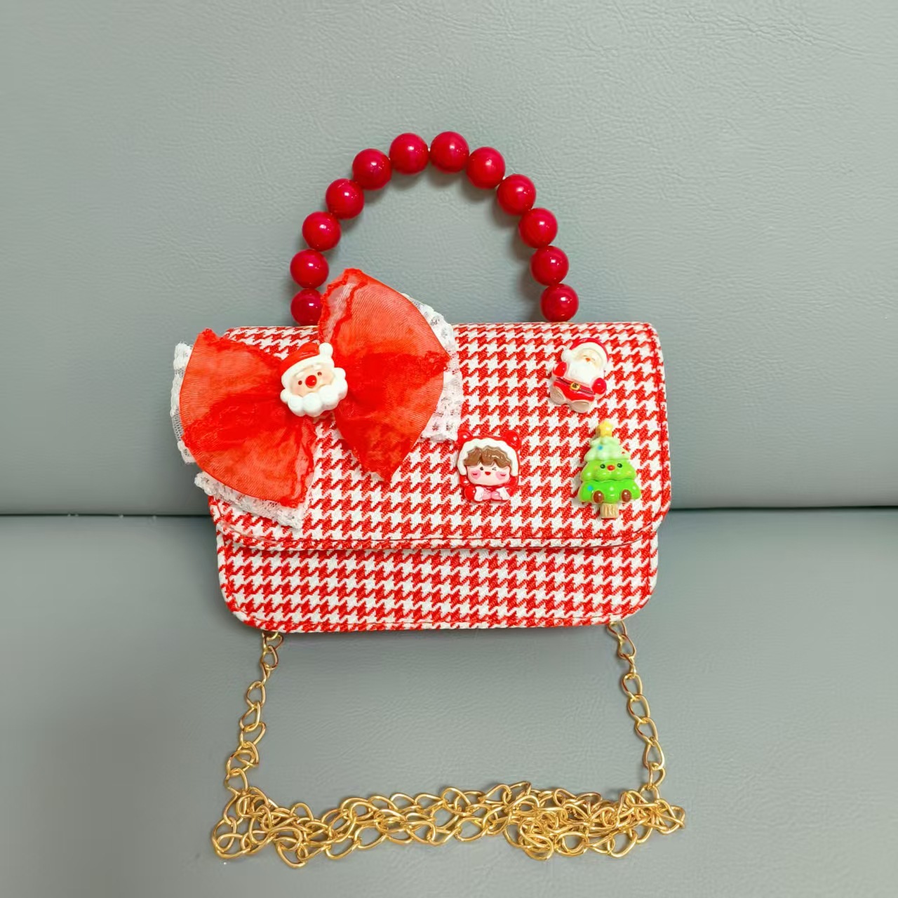 Cartera de Año Nuevo rojo arco de papá Noel bolso de perla pequeña cadena de viento fragante bolso de hombro