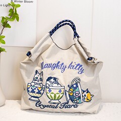 同じ刺繍の女性カバンのシングルショルダーバッグ、ナイロンカバン、防水トートバッグ、ネット赤手提げ斜め掛けバッグ