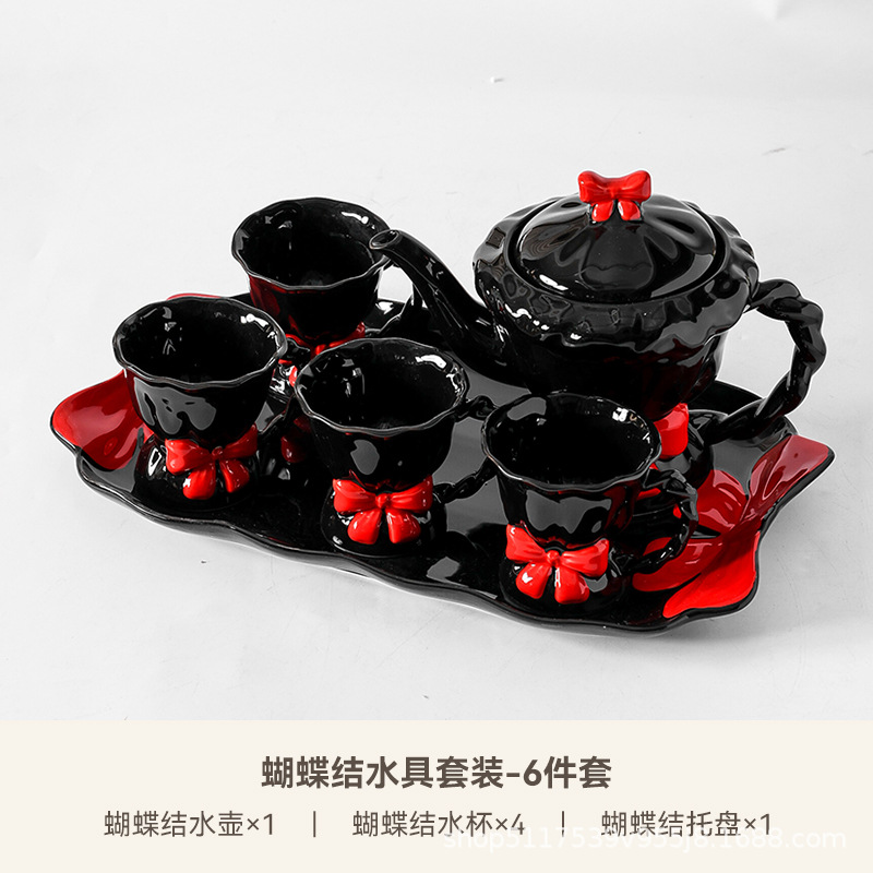 Una olla de cerámica, cuatro tazas de juego de té, caja de regalo de inauguración de la casa, lazo pintado a mano, taza de té de la tarde, regalo de boda