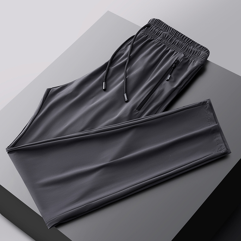 2025 verano pantalones deportivos de talla grande pantalones de hombre pantalones de aire acondicionado pantalones de seda de hielo de secado rápido pantalones de pierna recta gorda al por mayor